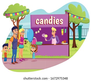 Banner Trade Tent with Inscription Candies Flat. Fair is Great Place to Spend Time with Whole Family. Husband and Wife and Children Stand Next to Stalls. Seller Offers Candy Canes.