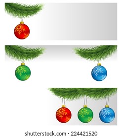 Banners with multicolored Christmas balls on pine branches