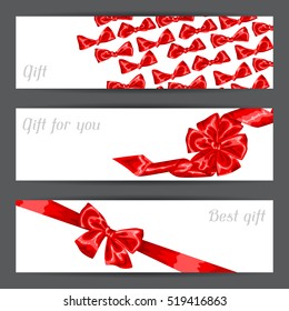 Banners with red satin gift bows and ribbons.
