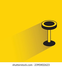 bar stool with shadow on yellow background