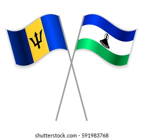 Barbadian and Basotho crossed flags. Barbados combined with Lesotho isolated on white. Language learning, international business or travel concept.