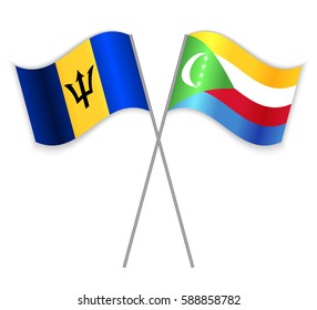Barbadian and Comoran crossed flags. Barbados combined with Comoros isolated on white. Language learning, international business or travel concept.