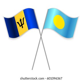 Barbadian and Palauan crossed flags. Barbados combined with Palau isolated on white. Language learning, international business or travel concept.