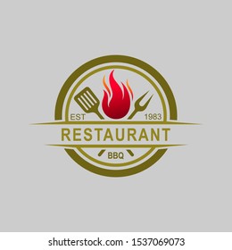 Barbecue logo with restaurant logotype and fire concept in combination with spatula