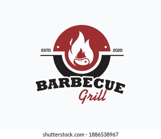 Barbecue restaurant - Logo icon of Barbecue, Grill and Bar with fire, grill fork and spatula. BBQ logo template. Vector illustration