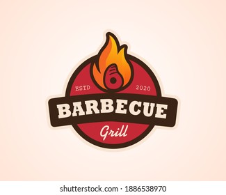 Barbecue restaurant - Logo icon of Barbecue, Grill and Bar with fire, grill fork and spatula. BBQ logo template. Vector illustration