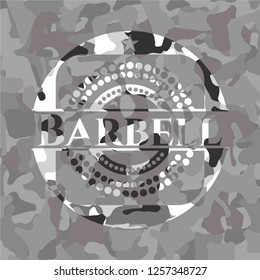 Barbell on grey camouflaged texture