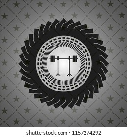 barbell on rack icon inside dark badge or emblem
