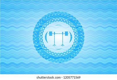 barbell on rack icon inside sky blue water emblem background.
