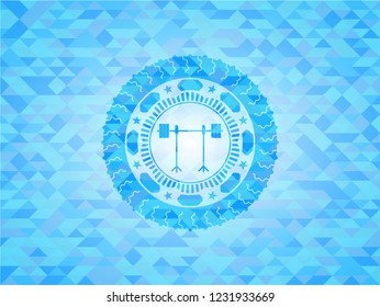 barbell on rack icon inside light blue mosaic emblem