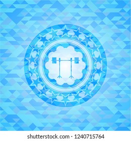 barbell on rack icon inside sky blue emblem. Mosaic background