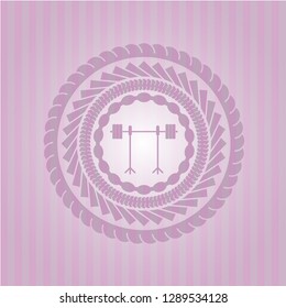 barbell on rack icon inside badge with pink background