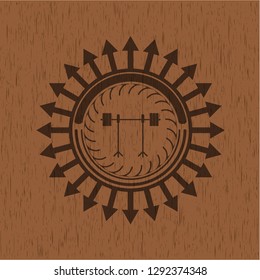 barbell on rack icon inside wood badge or emblem