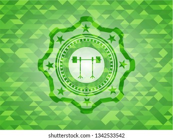 barbell on rack icon inside green emblem with mosaic ecological style background