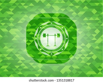 barbell on rack icon inside realistic green emblem. Mosaic background