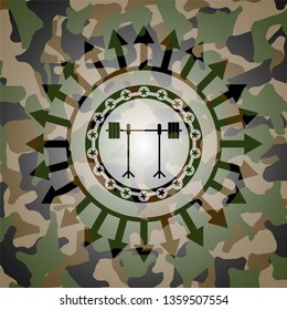 barbell on rack icon inside camouflaged emblem