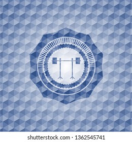 barbell on rack icon inside blue badge with geometric pattern background.