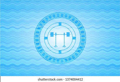 barbell on rack icon inside water style badge.