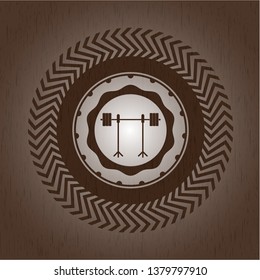 barbell on rack icon inside wood emblem. Vintage.