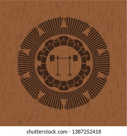 barbell on rack icon inside realistic wood emblem