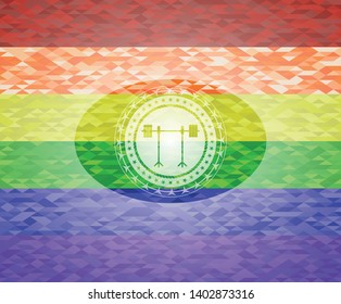 barbell on rack icon inside emblem on mosaic background with the colors of the LGBT flag