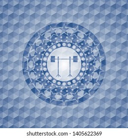 barbell on rack icon inside blue badge with geometric background.