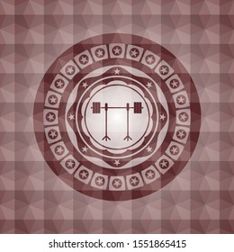 barbell on rack icon inside red seamless emblem or badge with geometric pattern background.