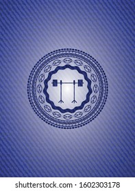 barbell on rack icon inside emblem with denim high quality background