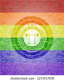 barbell on rack icon on mosaic background with the colors of the LGBT flag