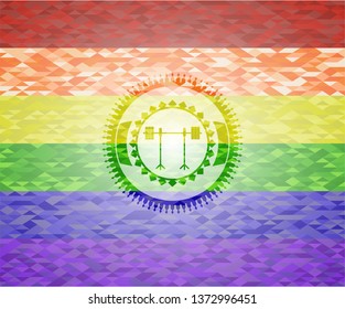 barbell on rack icon on mosaic background with the colors of the LGBT flag