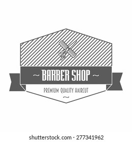Barber Shop emblems or labels depicting a comb and scissors with text, one in a shield and the other with a ribbon banner and wreath, vector illustration on white