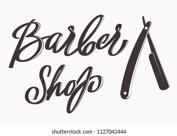 barber shop inscription and razor