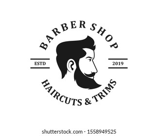 Barber shop logo template. Handsome man with beard and mustache. Scissors. Barber shop symbol.