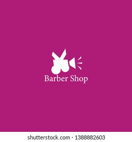the barber shop logo, with unique scissors and video recorders makes it. modern, unique, elegant