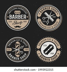 Barber shop set of four vector colored vintage round badges, emblems, labels or logos on dark background