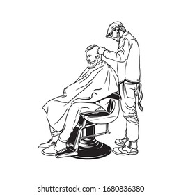 Barberman doing his job with a man sits in barber chair