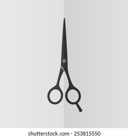 Barber's shears scissors vector icon. Effect of folded paper. Flat design
