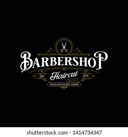 Barbershop logo design. Vintage lettering illustration on dark background. 