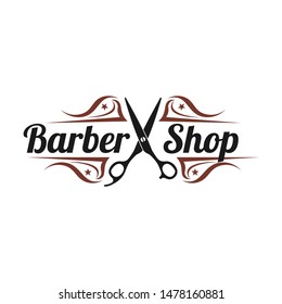 Barbershop logo with a hair scissor and ornament