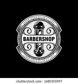 Barbershop logo vintage with barber pole.