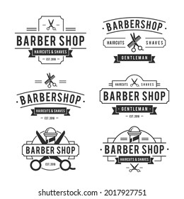 Colección del logotipo de Barbershop vintage con tijeras y peine