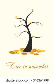 Bare tree in November , fallen yellow leaves