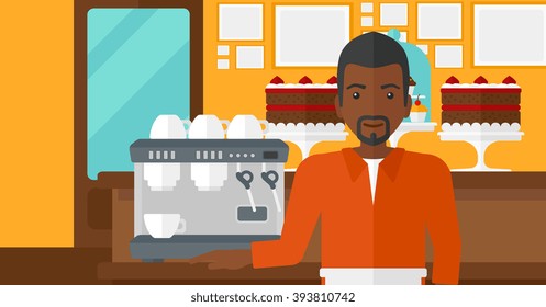 Barista standing near coffee maker.
