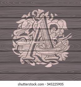 Baroque letters of the alphabet in upper case letters on wooden background. Letter A . Vector illustration