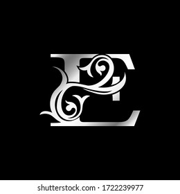 Letra barroca dorada e icono con logotipo de hoja floral, concepto clásico de vectorial vintado monograma para la identidad inicial