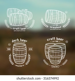 Barrel homebrew emblems in thin line style. White print on blurred background