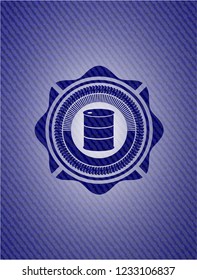 barrel icon inside emblem with jean background