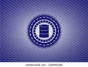 barrel icon inside emblem with jean background