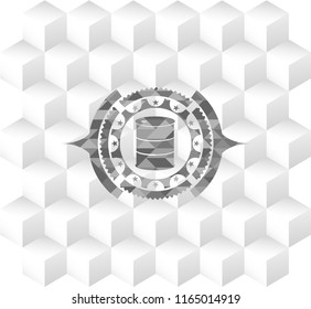 barrel icon inside grey emblem with geometric cube white background