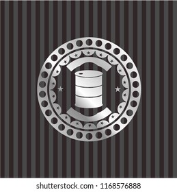 barrel icon inside silvery emblem or badge